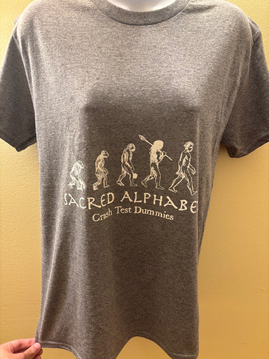 Gray t-shirt with 'Sacred Alphabet' text and design on a yellow background